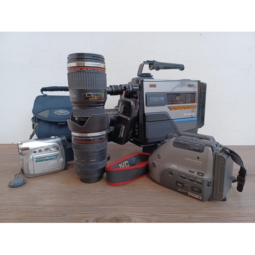 763 - Five items, two camera lens travel mugs, one cased JVC GR-D240EK Mini DV camcorder, one JVC GR-AX10 ... 