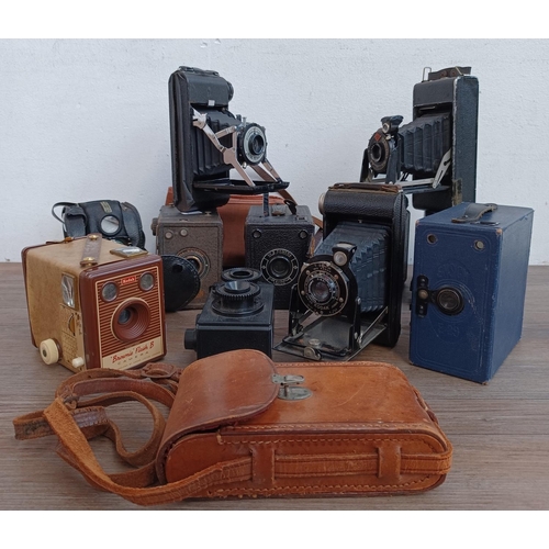 767 - A collection of box and folding cameras to include Kodak No.2 Brownie, Ensign, Agfa, Kershaw etc.