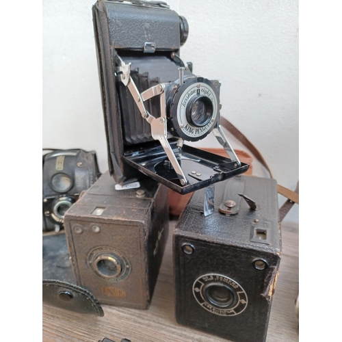 767 - A collection of box and folding cameras to include Kodak No.2 Brownie, Ensign, Agfa, Kershaw etc.