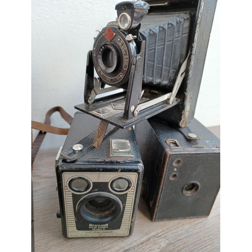 767 - A collection of box and folding cameras to include Kodak No.2 Brownie, Ensign, Agfa, Kershaw etc.