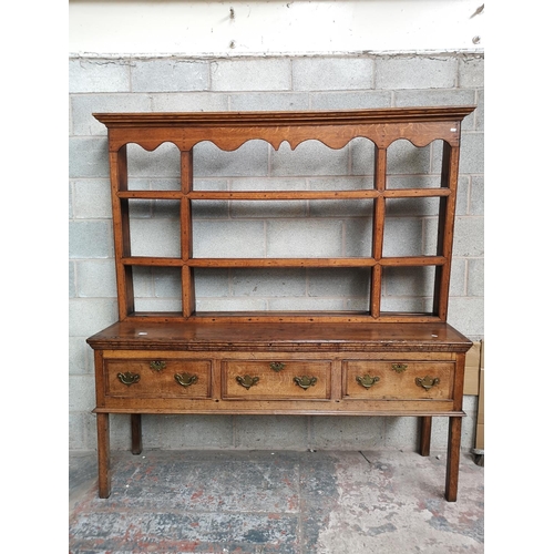 1 - A George III oak and mahogany crossbanded dresser base and plate rack - approx. 193cm high x 180cm w... 