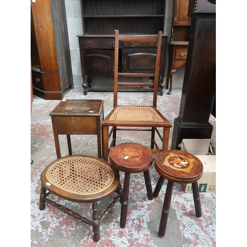 10 - Five pieces of furniture, two hardwood circular topped tri footed stools, one mid 20th century oak s... 