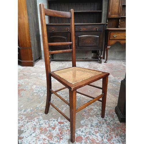 10 - Five pieces of furniture, two hardwood circular topped tri footed stools, one mid 20th century oak s... 