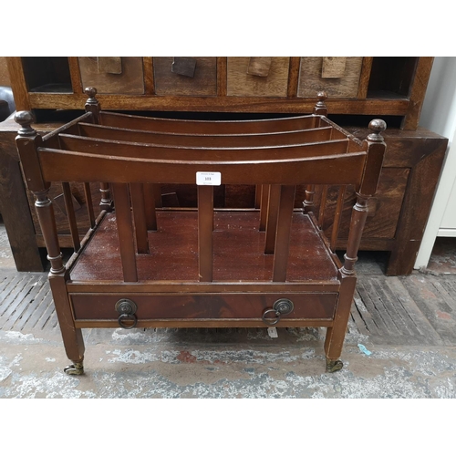 103 - A Regency style mahogany three section Canterbury