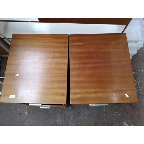 109 - A pair of teak effect two drawer office filing cabinets