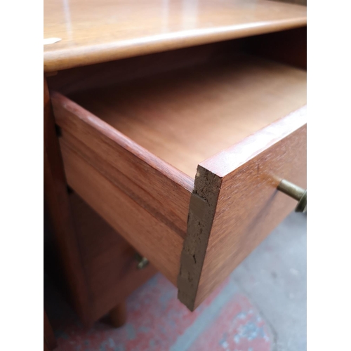 112 - A pair of mid 20th century teak chests of three drawers - approx. 57cm high x 65cm wide x 39cm deep