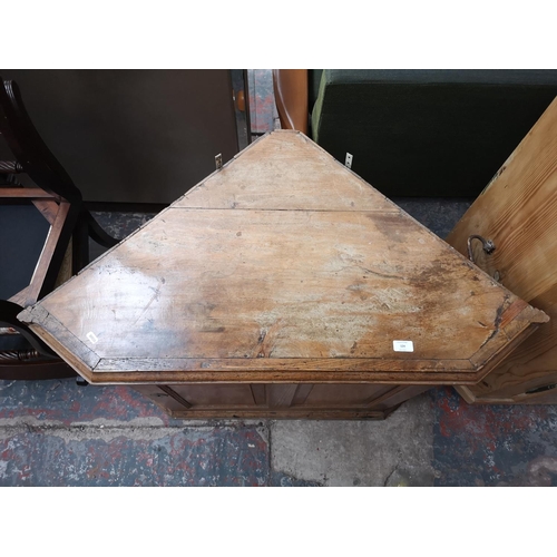 124 - A 19th century pine free standing corner cabinet base - approx. 78cm high