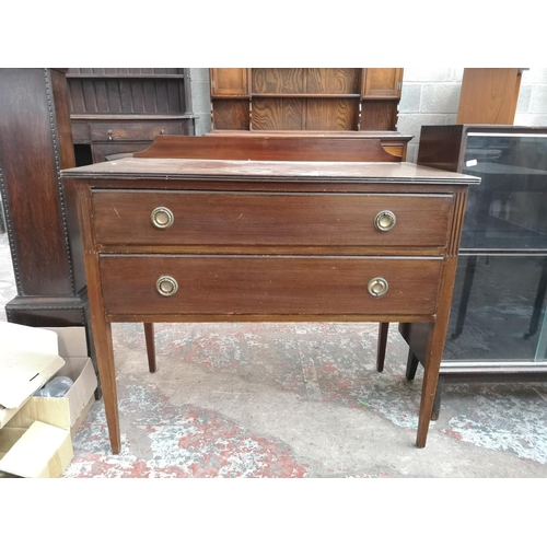 13 - An Edwardian mahogany chest of two drawers