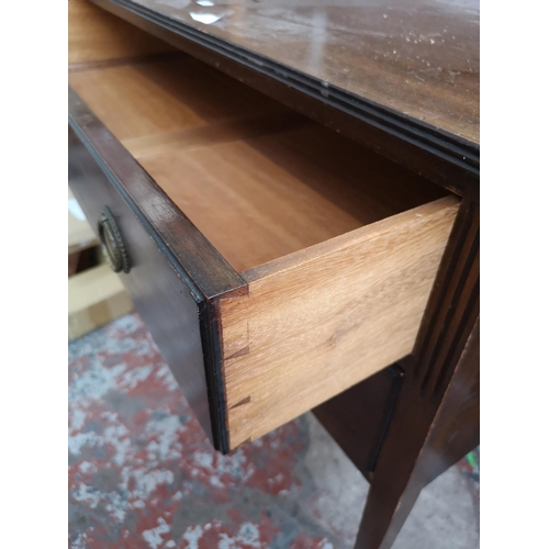 13 - An Edwardian mahogany chest of two drawers