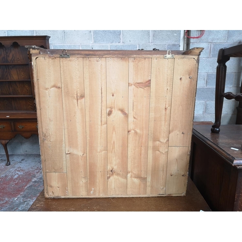 16 - A pine wall mountable display cabinet with two glazed doors - approx. 65cm high x 68cm wide x 13cm d... 