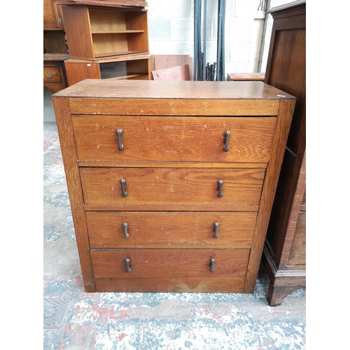 17 - An Art Deco oak chest of four drawers - approx. 87cm high x 76cm wide x 38cm deep