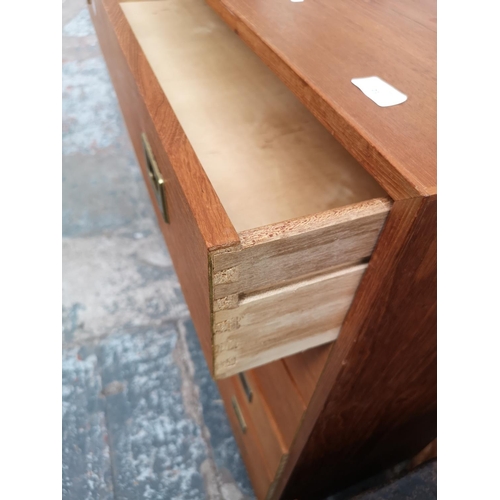 21 - A teak chest of six drawers - approx. 101cm high x 88cm wide x 40cm deep