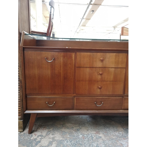 29 - A mid 20th century Wrighton walnut sideboard - approx. 95cm high x 138cm wide x 45cm deep