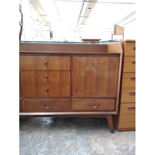 29 - A mid 20th century Wrighton walnut sideboard - approx. 95cm high x 138cm wide x 45cm deep