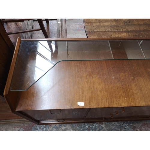 29 - A mid 20th century Wrighton walnut sideboard - approx. 95cm high x 138cm wide x 45cm deep