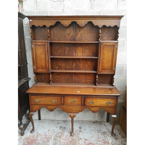 3 - A George III style oak dresser - approx. 196cm high x 153cm wide x 43cm deep