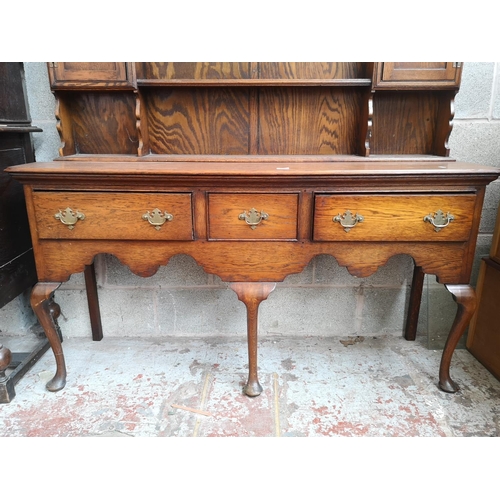 3 - A George III style oak dresser - approx. 196cm high x 153cm wide x 43cm deep