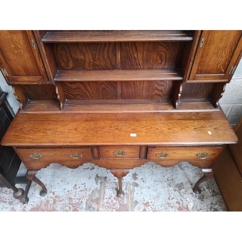 3 - A George III style oak dresser - approx. 196cm high x 153cm wide x 43cm deep