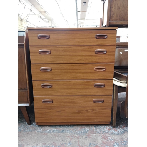 30 - A Schreiber teak effect chest of five drawers