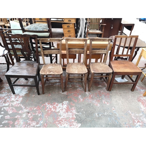 37 - Five chairs, three early 20th century elm and beech chapel chairs and two Georgian oak dining chairs