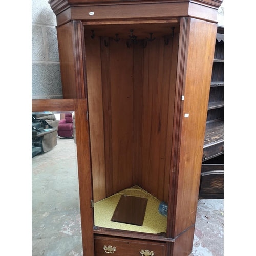 5 - An early 20th century mahogany corner gentleman's wardrobe - approx. 200cm high