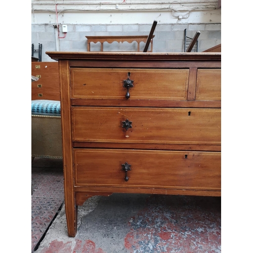 52 - An Edwardian inlaid mahogany chest of two short over two long drawers - approx. 79cm high x 107cm x ... 