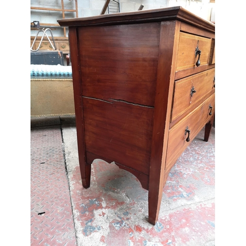 52 - An Edwardian inlaid mahogany chest of two short over two long drawers - approx. 79cm high x 107cm x ... 