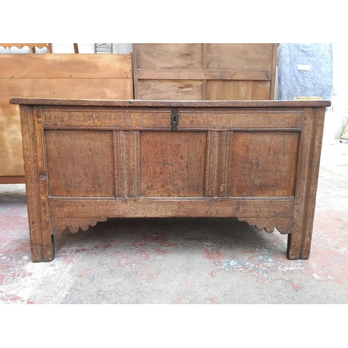 55 - A 19th century oak three panel coffer - approx. 65cm high x 118cm wide x 54cm deep