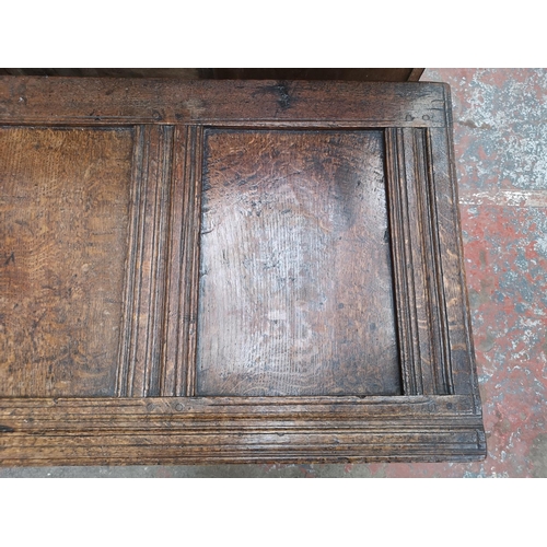 55 - A 19th century oak three panel coffer - approx. 65cm high x 118cm wide x 54cm deep