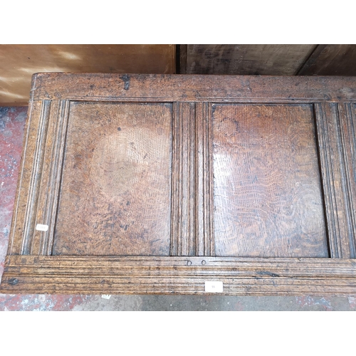 55 - A 19th century oak three panel coffer - approx. 65cm high x 118cm wide x 54cm deep