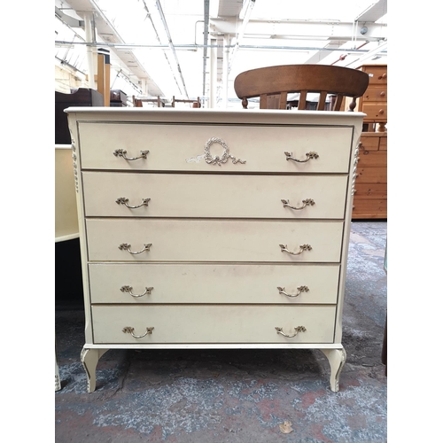 60 - A French style white painted chest of five drawers