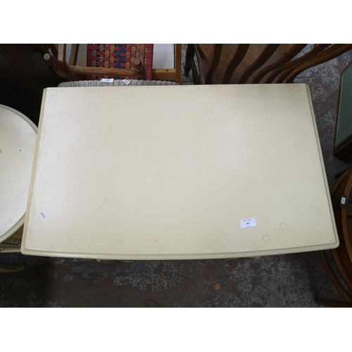 60 - A French style white painted chest of five drawers