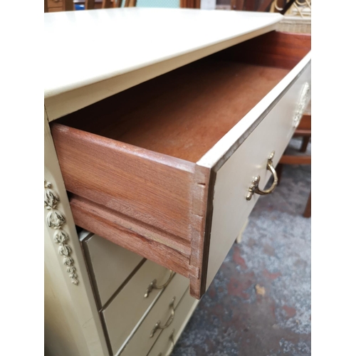 60 - A French style white painted chest of five drawers