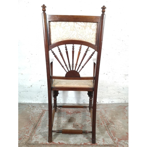 61 - A Victorian Aesthetic Movement mahogany and floral upholstered armchair stamped B6 to base, in the s... 