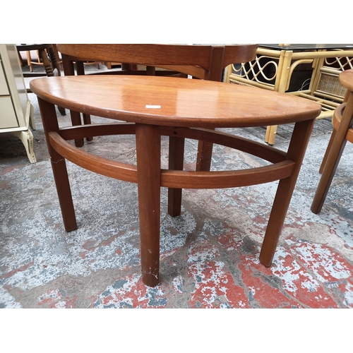 62 - A Nathan teak and glass Trinity coffee table with three nesting tables - approx. 51cm high x 81cm di... 