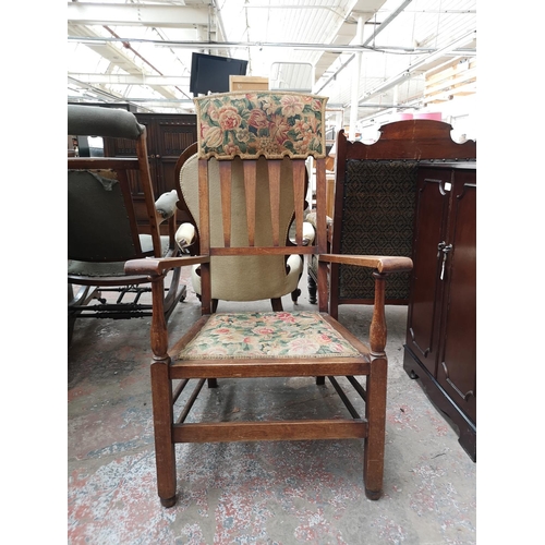 71 - An Arts & Crafts mahogany and floral upholstered armchair