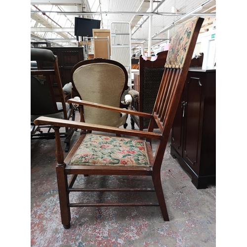 71 - An Arts & Crafts mahogany and floral upholstered armchair