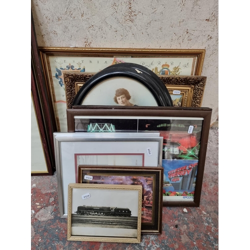 171 - A large collection of framed and unframed pictures