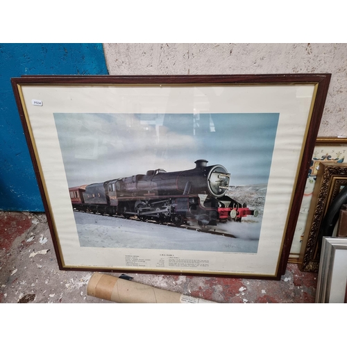 171 - A large collection of framed and unframed pictures