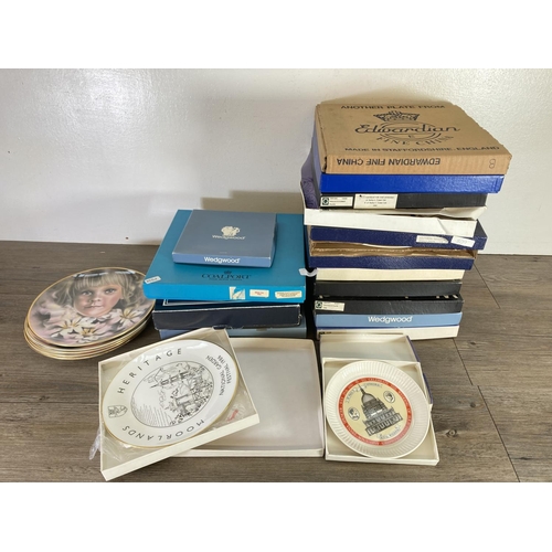 367 - A large collection of ceramic collector's plates to include five Wedgwood Eyes of the Child, Goss Mo... 