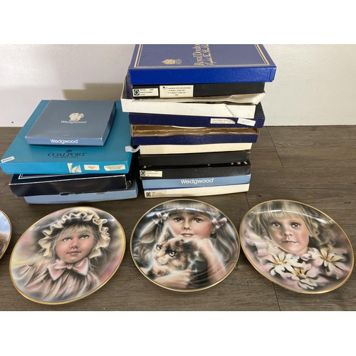 367 - A large collection of ceramic collector's plates to include five Wedgwood Eyes of the Child, Goss Mo... 