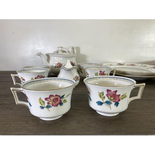 368 - A collection of Wedgwood Chinese Flowers bone china to include six tea cups, six saucers, tea pot, m... 