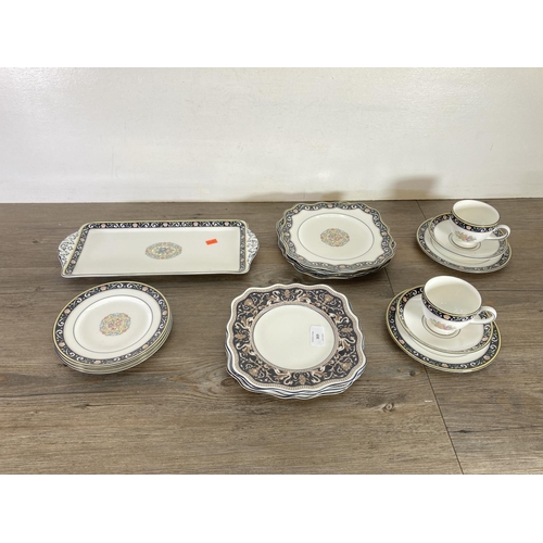 369 - A collection of Wedgwood Florentine and Runnymede bone china