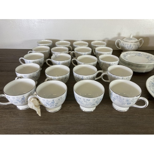 380 - A collection of Wedgwood Belle Fleur bone china to include twenty teacups, thirteen saucers, sugar b... 