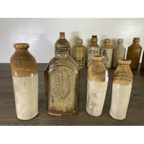 385 - A collection of 19th century stoneware bottles to include G Turner Wine Merchants Stockport, W. Turn... 