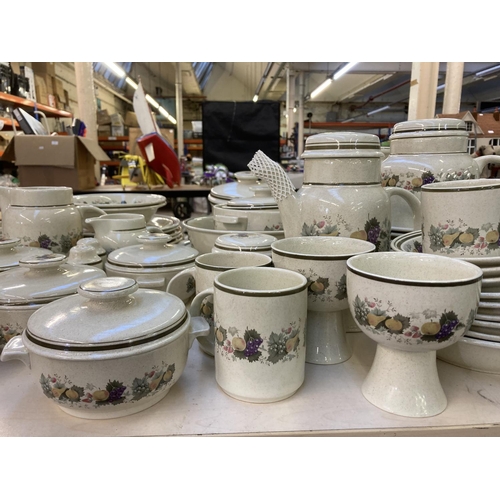 388 - A large collection of Royal Doulton Harvest Garland tableware to include tureens, teapots, cups etc.