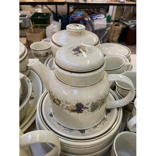 388 - A large collection of Royal Doulton Harvest Garland tableware to include tureens, teapots, cups etc.