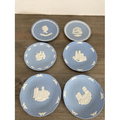 333 - A collection of Wedgwood pale blue Jasperware to include trinket dishes, plates etc.