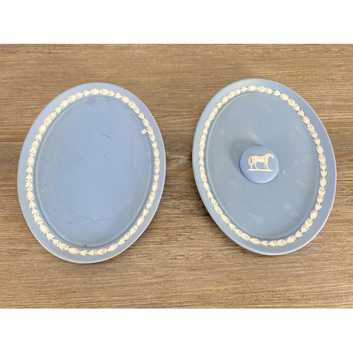 333 - A collection of Wedgwood pale blue Jasperware to include trinket dishes, plates etc.