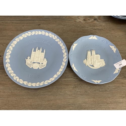 333 - A collection of Wedgwood pale blue Jasperware to include trinket dishes, plates etc.